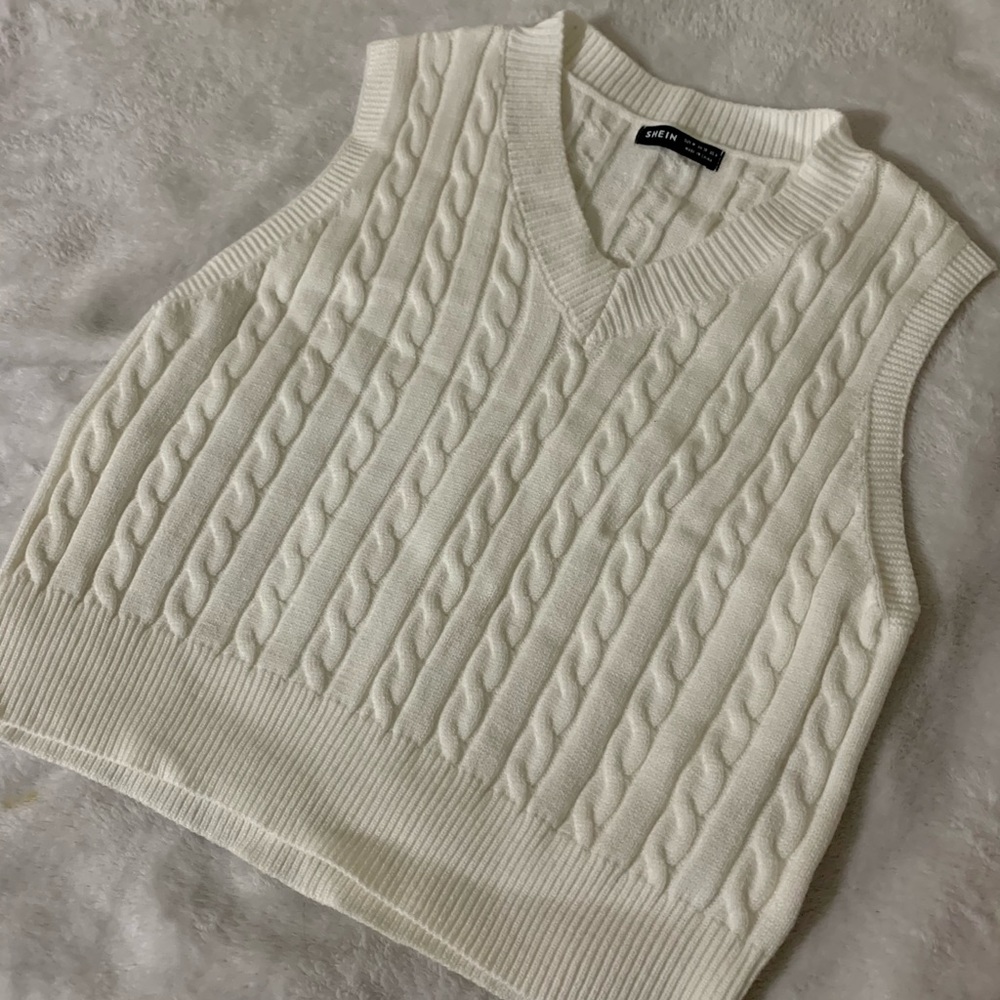 White sweater vest
